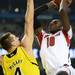 Michigan freshman Mitch McGary looks to block Louisville junior Gorgui Dieng in the first half of the national championship game at the Georgia Dome in Atlanta on Monday, April 8, 2013. Melanie Maxwell I AnnArbor.com